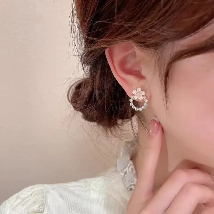 Fashion dripping oil peach blossom stud earrings for women in alloy with electroplated finish