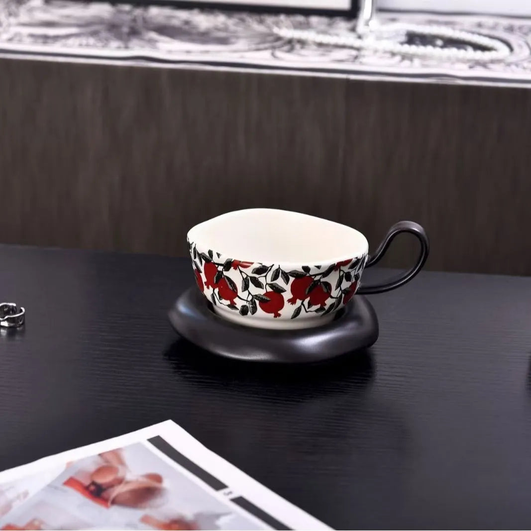 Retro antique style ceramic coffee cup and saucer set in black or orange with 210ml capacity.