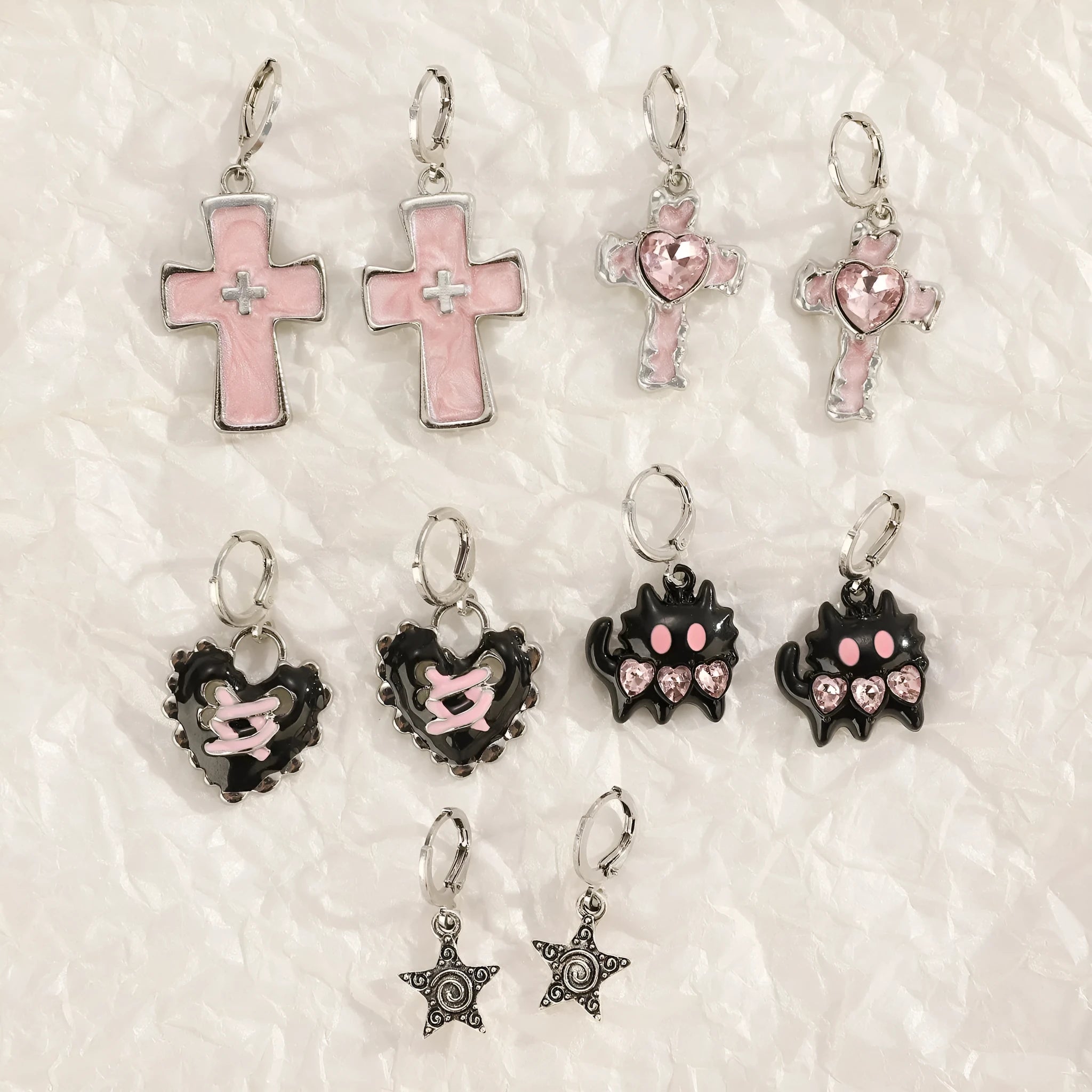 Women's cross crystal earrings in alloy with five colour options showing drip oil finish and geometric designs