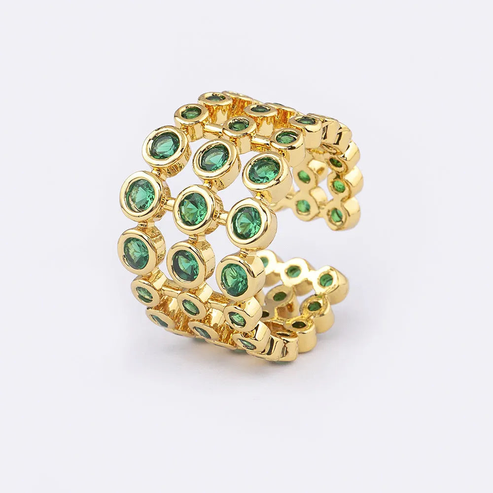 Copper ring with 18K gold plating and green zircon accents in wide band three-layer design