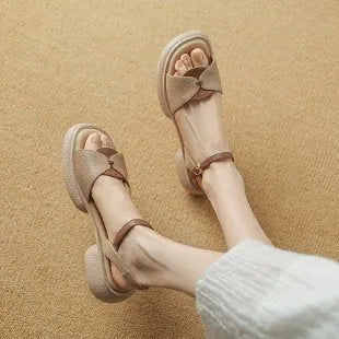 Women's khaki chunky heel platform sandals with open toe and rubber sole.