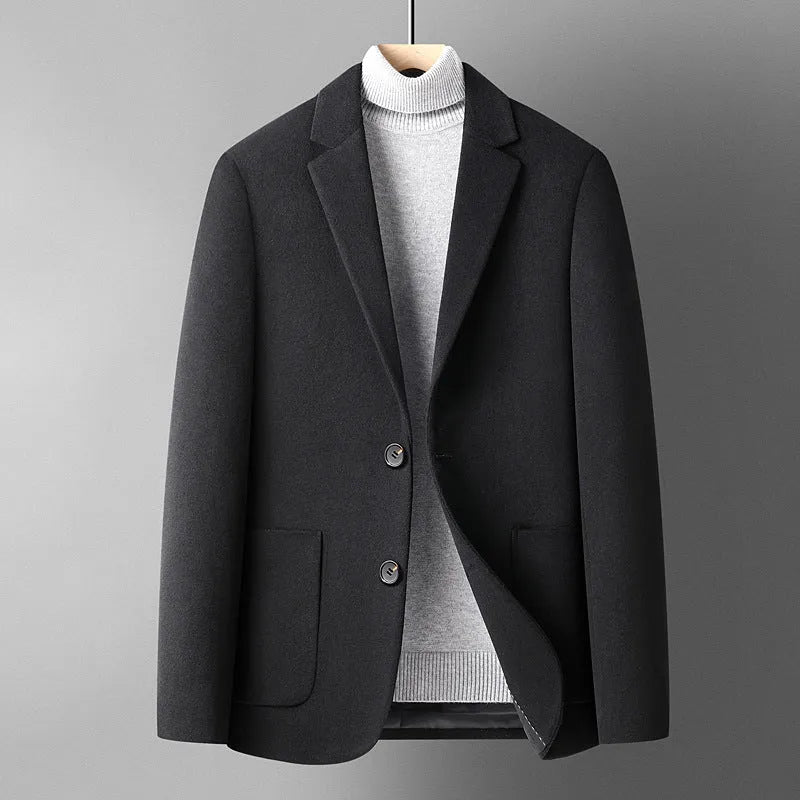Men's slim fit wool suit jacket in grey shown on a model, suitable for autumn and winter wear.