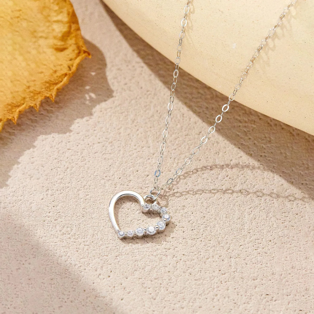 Sterling silver hollow heart necklace for women with gold plating options