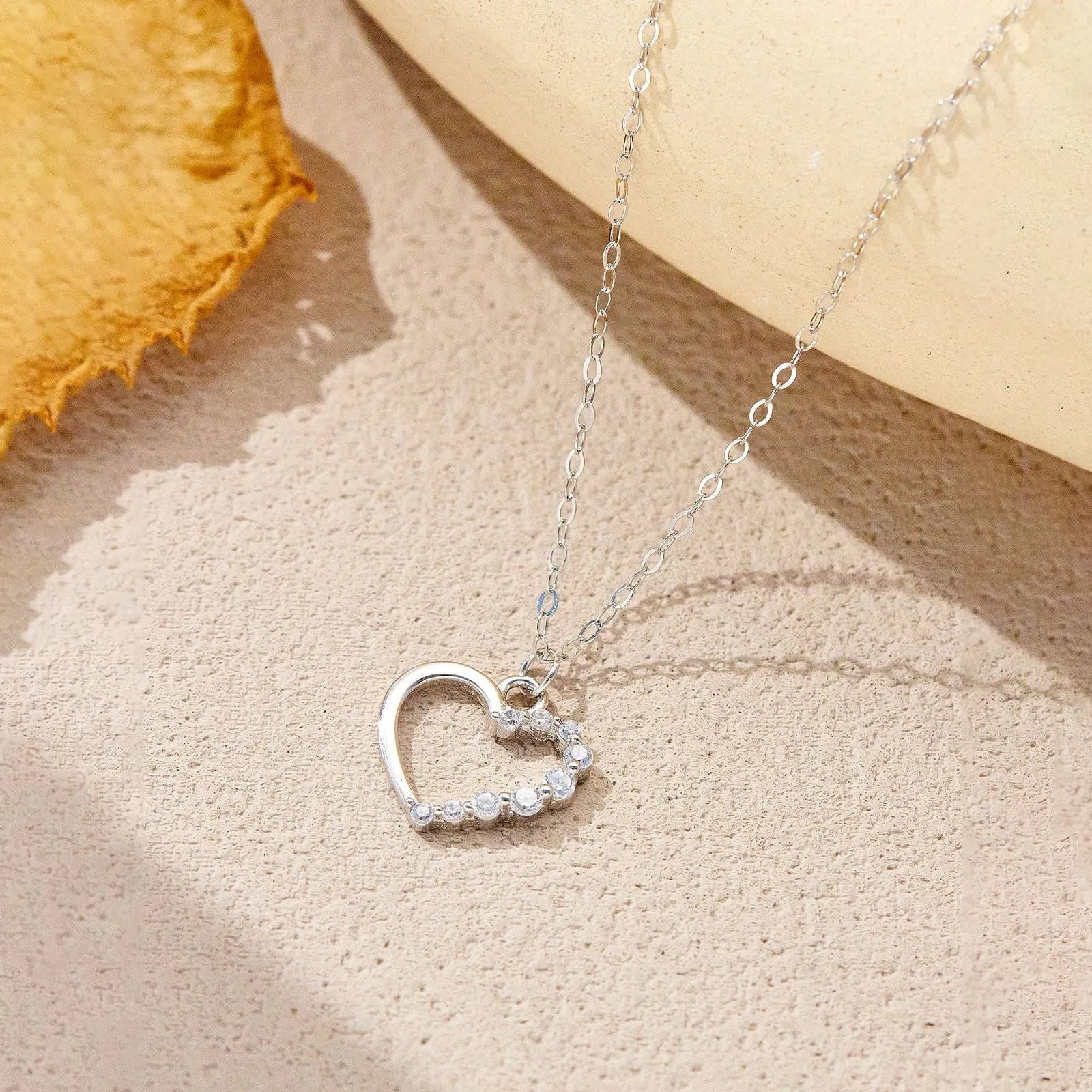 Sterling silver hollow heart necklace for women with gold plating options