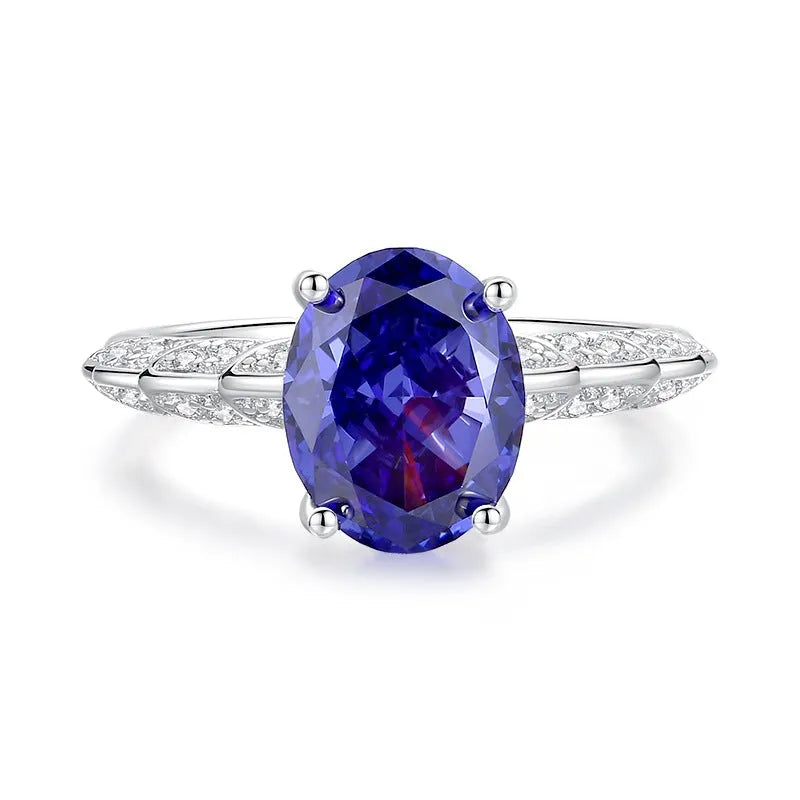 Heart-shaped sterling silver ring with a faceted ice flower cut zircon stone in a Tan Sang colour tone.