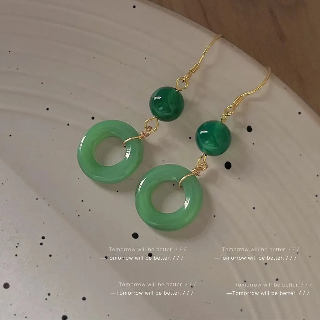 Green Chinese peace buckle earrings with geometric design and 14K gold plating