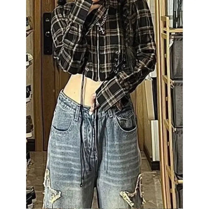 Blue high-waist straight-leg women's jeans on a neutral background