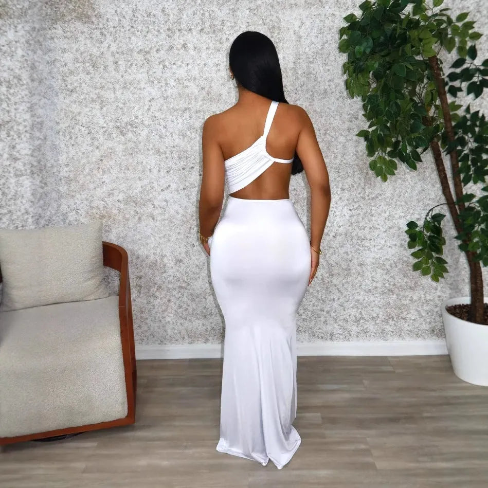 Women's solid colour one-shoulder long dress with a pleated skirt in a milk silk blend fabric.