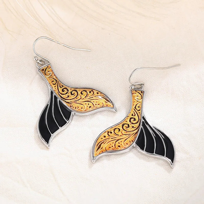 Women's retro style fishtail earrings with whale design in white gold colour