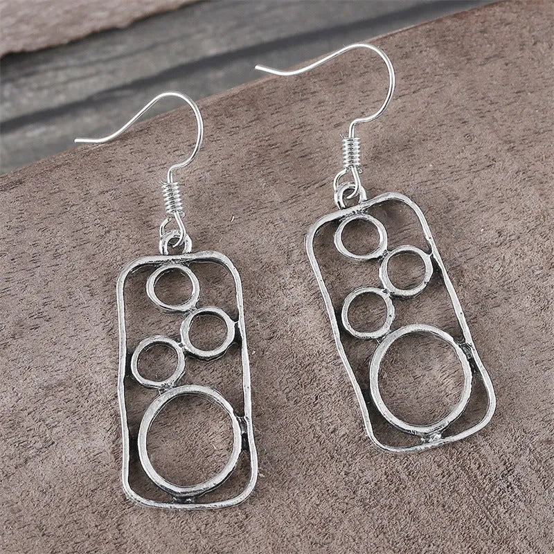 Geometric earrings with irregular square and round design in antique silver colour
