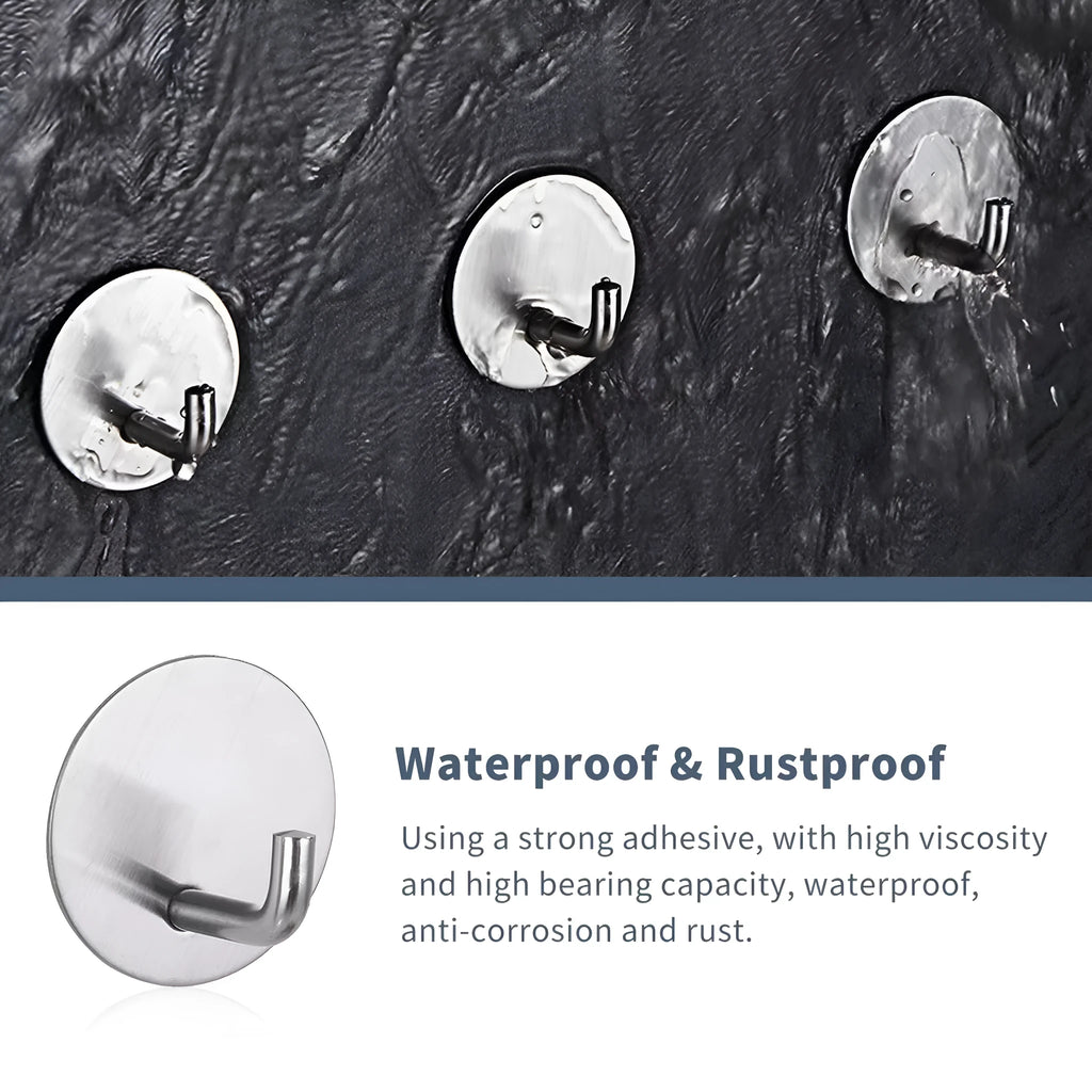 Stainless steel round self-adhesive hook for wall mounting.
