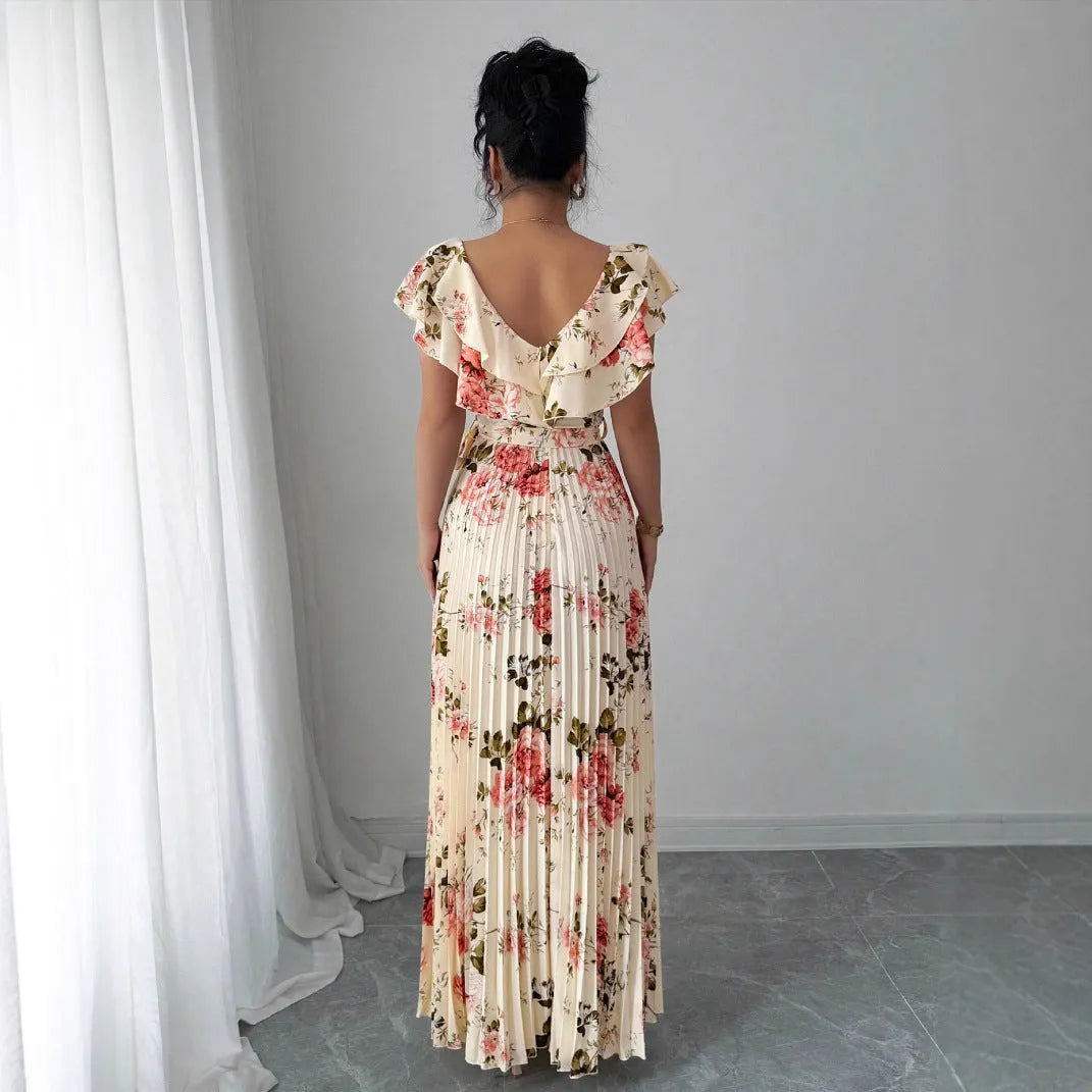 Apricot floral print women's dress with V-neck, ruffled sleeves, and oversized swing skirt