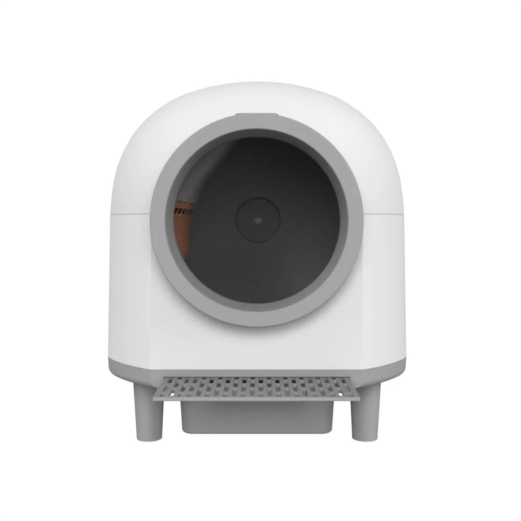White automatic enclosed self-cleaning litter box for cats.