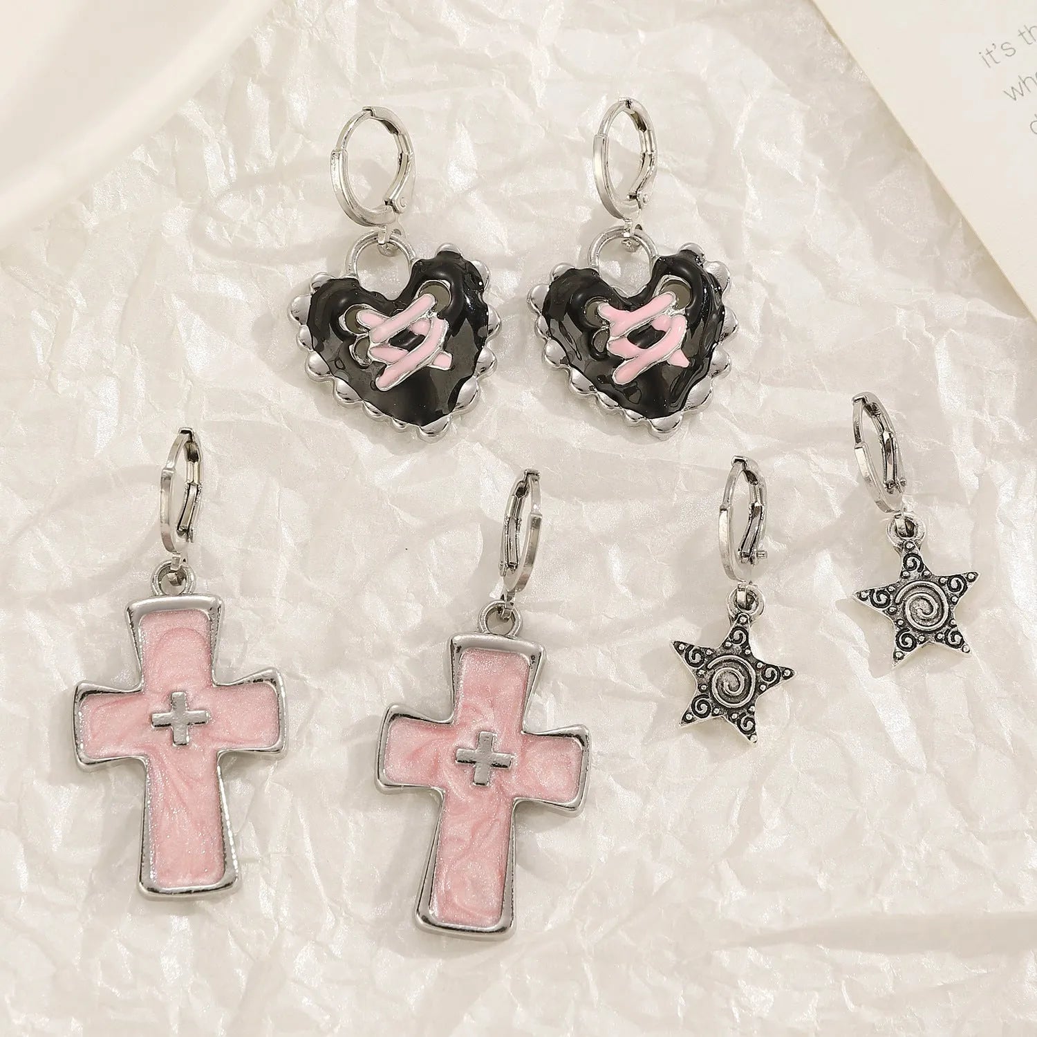 Women's cross crystal earrings in alloy with five colour options showing drip oil finish and geometric designs