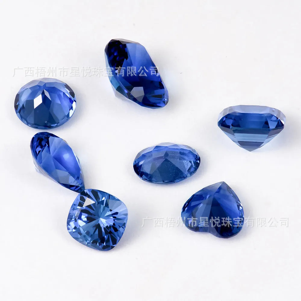 Royal blue heart-shaped tiara design cultivated gemstone on a white background