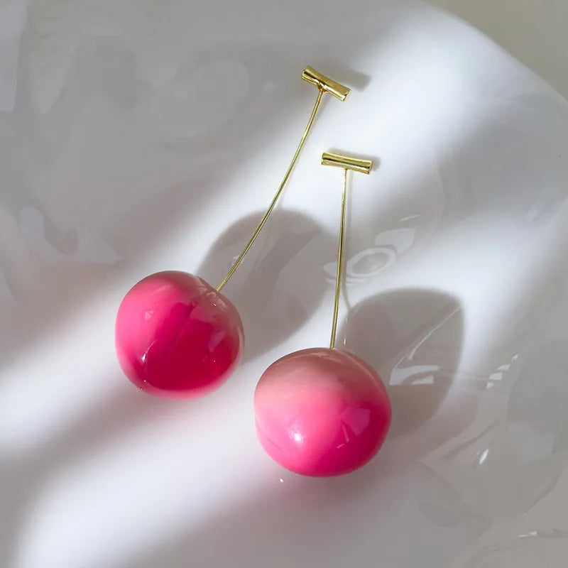 Acrylic peach fruit earrings in small and large sizes with copper components