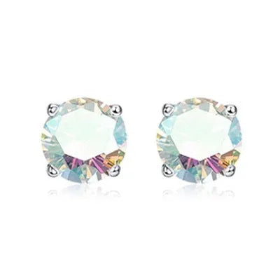 Double-headed zircon titanium alloy navel stud in various colours on a white background.