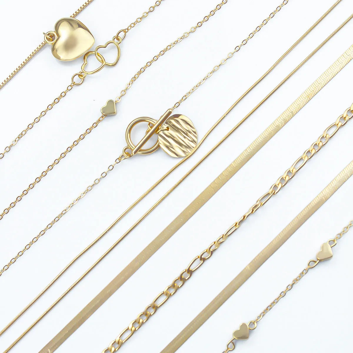 Women's gold electroplated necklace set with ten alloy pendants on adjustable snake bones chain
