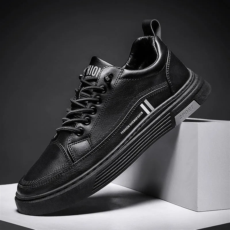 Men's white low-top skate shoes with a microfiber upper and elastic band, shown on a grey background.