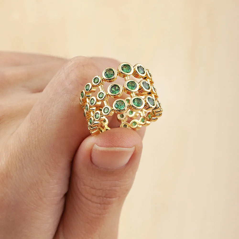 Copper ring with 18K gold plating and green zircon accents in wide band three-layer design