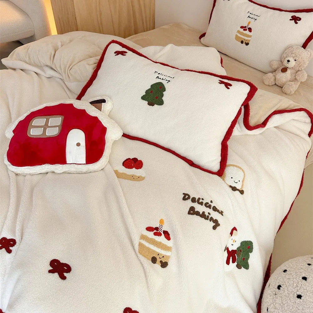 Winter Christmas cartoon bedding four-piece set with snowman and heart pattern on duvet cover and pillowcases.