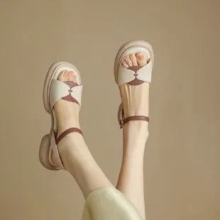 Women's khaki chunky heel platform sandals with open toe and rubber sole.