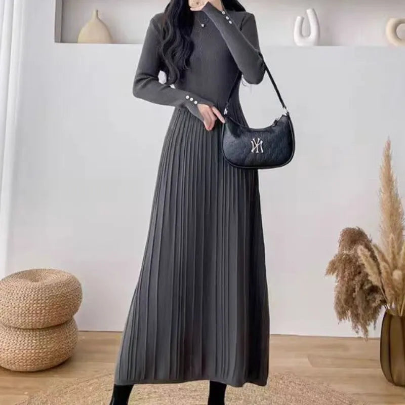Women's knitted high waist A-line skirt dress in a solid colour, mid-length below the knees