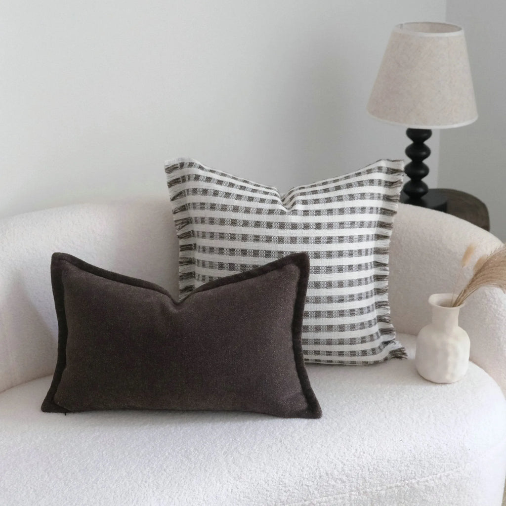 Coffee brown striped Chinese classical style cushion pillow on a sofa in 45x45cm size.