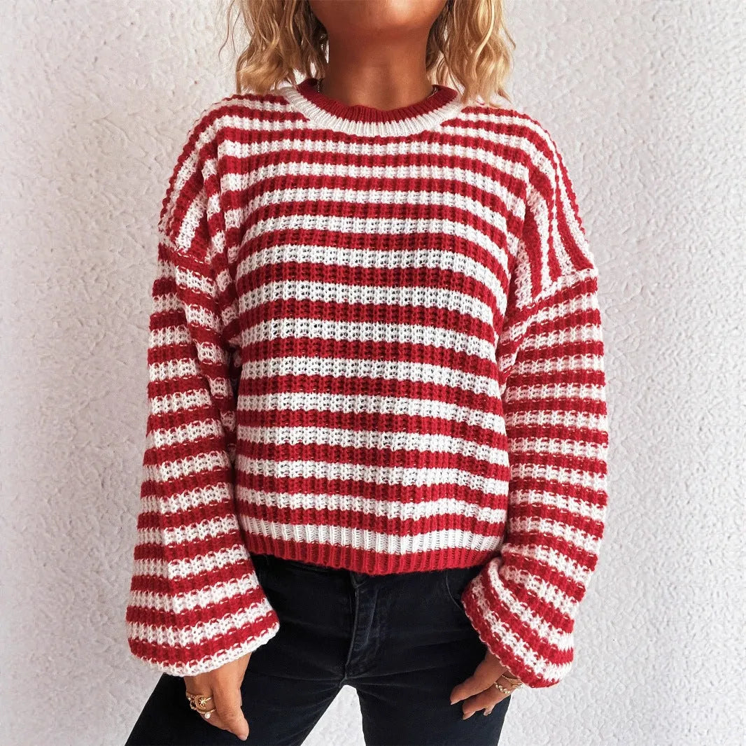 Women's striped loose pullover sweater in polyester knit with round neck and long sleeves
