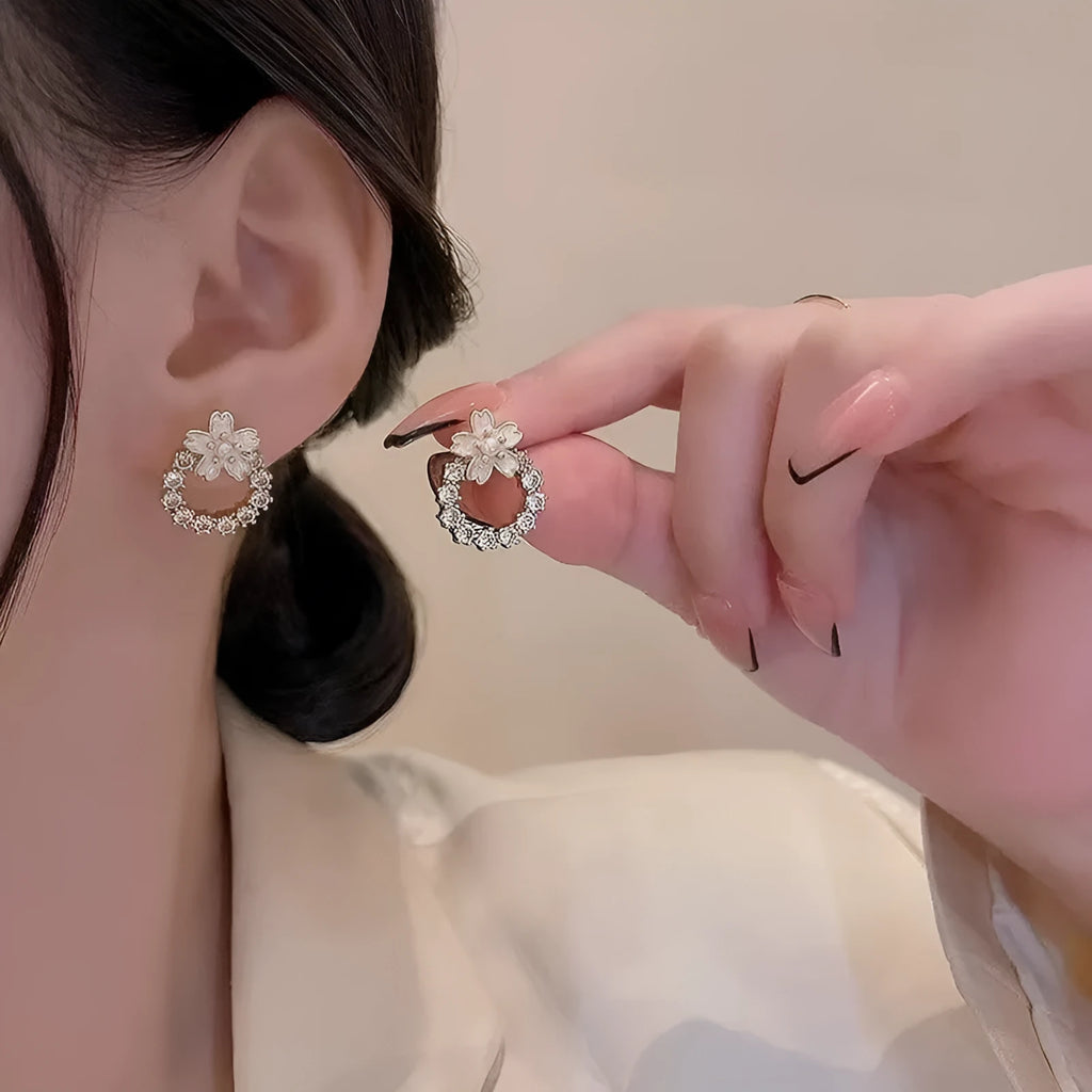 Fashion dripping oil peach blossom stud earrings for women in alloy with electroplated finish