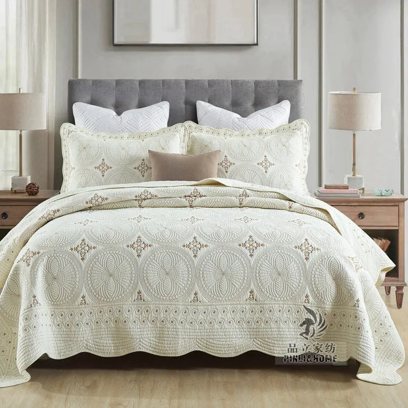 European-style pure cotton embroidered bed cover set with two pillowcases on a bed