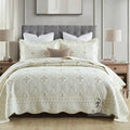 European-style pure cotton embroidered bed cover set with two pillowcases on a bed