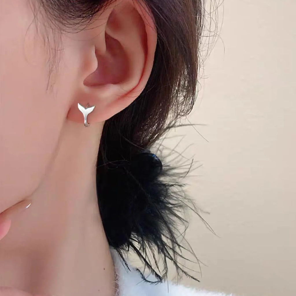Women's fishtail earrings in copper with electroplated white gold or yellow gold finish