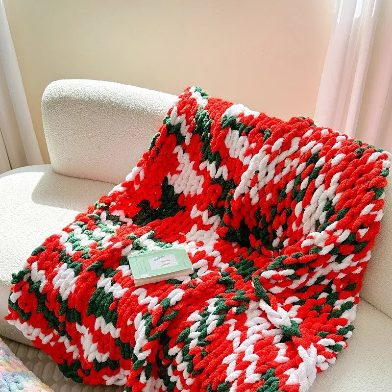 Thick striped chenille blanket in a choice of four colours, shown laid flat displaying its 130x170cm size.