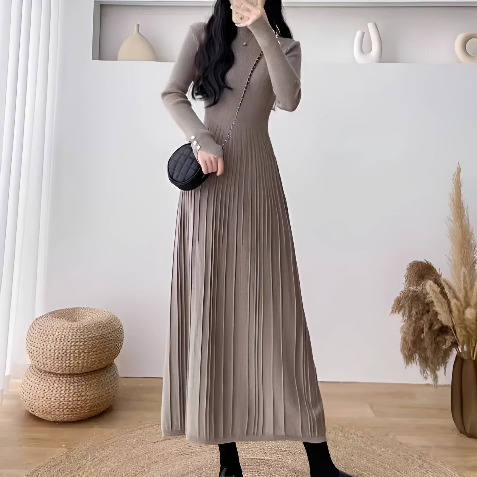 Women's knitted high waist A-line skirt dress in a solid colour, mid-length below the knees