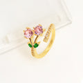 Copper geometric open ring with gold plating and zircon leaf decoration
