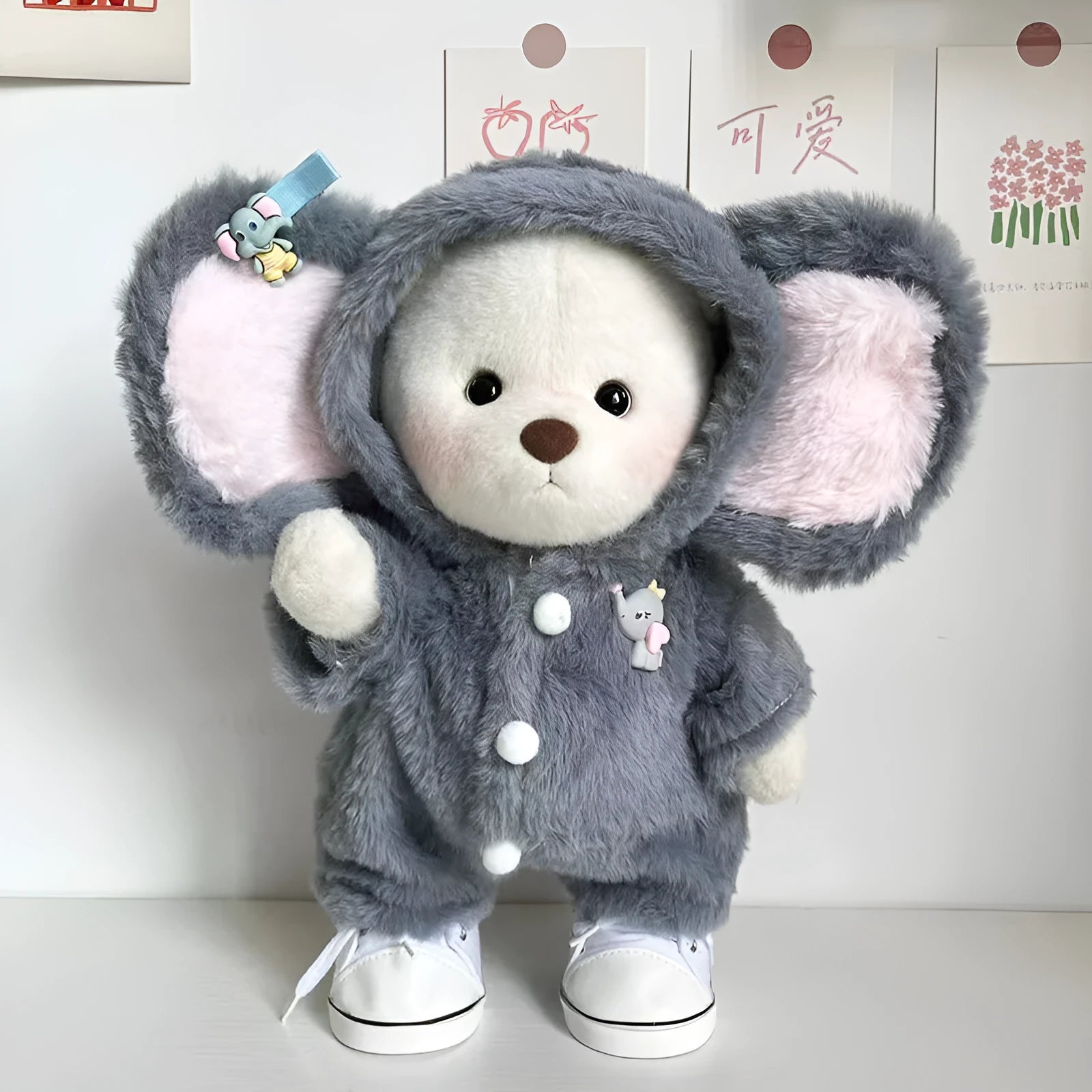 Grey elephant plush jumpsuit suit for a 30cm Lina bear doll on a white background.