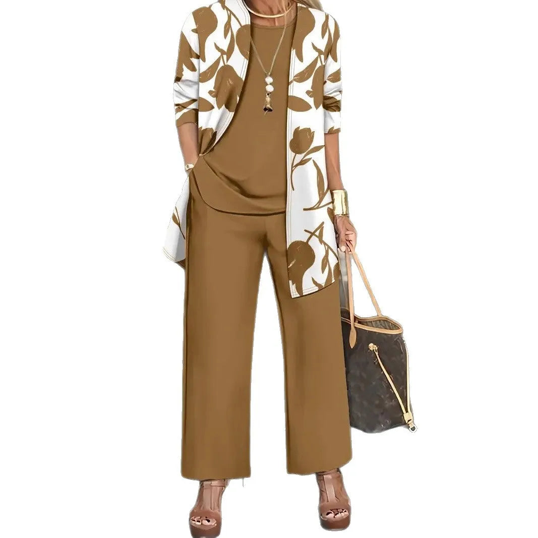 Women's blue three-piece casual suit comprising a long-sleeve coat, a vest, and trousers on a hanger.