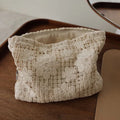 Handmade crocheted hollow flower cosmetic bag with ethnic embroidery on corduroy fabric