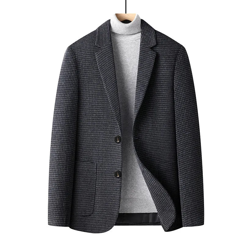 Men's slim fit wool suit jacket in grey shown on a model, suitable for autumn and winter wear.
