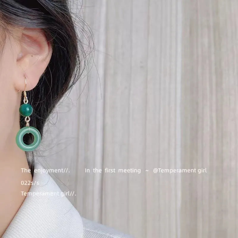 Green Chinese peace buckle earrings with geometric design and 14K gold plating