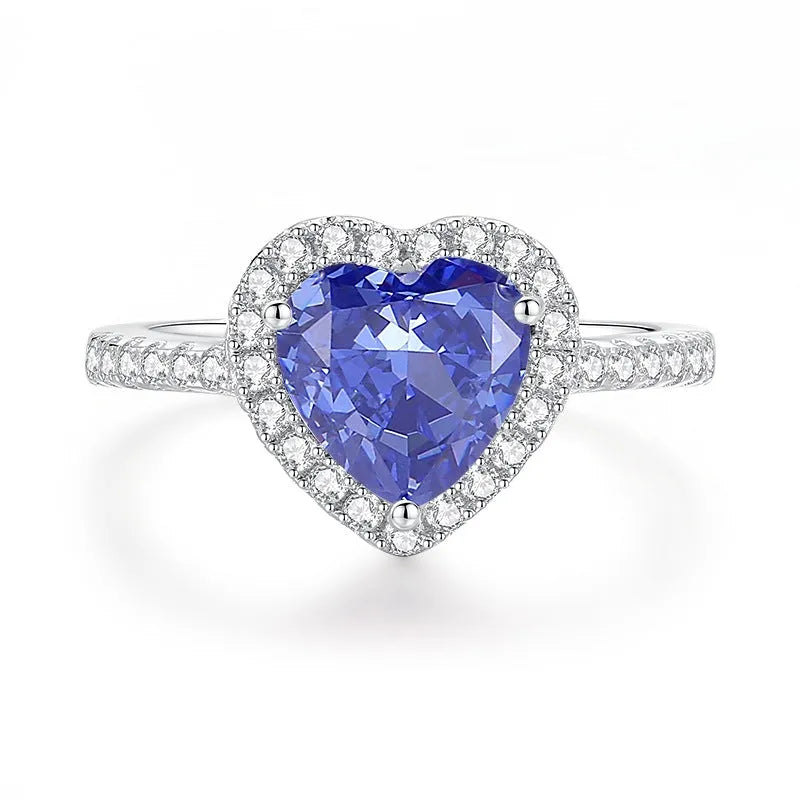 Heart-shaped sterling silver ring with a faceted ice flower cut zircon stone in a Tan Sang colour tone.
