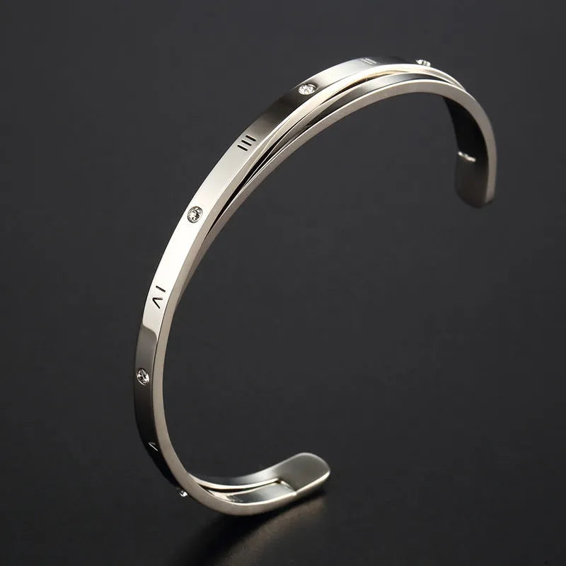 Open-ended women's bracelet with inlaid zircon stones on wrist