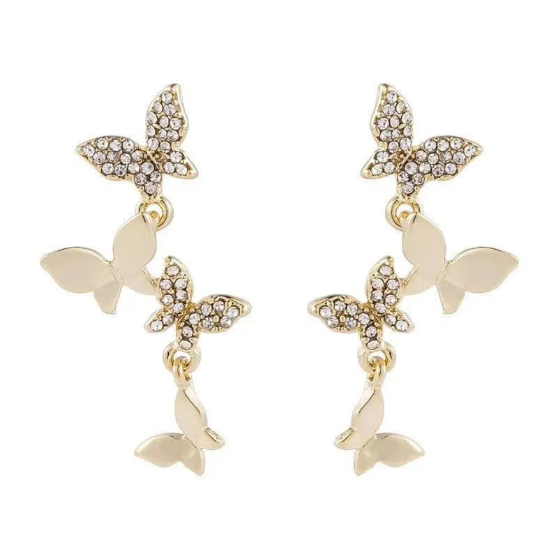 Gold colour copper butterfly earrings for women with four butterfly drop design
