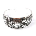 Open carved Miao silver alloy bracelet with elephant and turtle motifs on a Roman-shaped band.