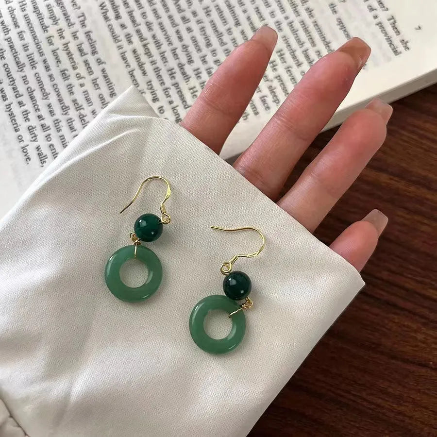 Green Chinese peace buckle earrings with geometric design and 14K gold plating