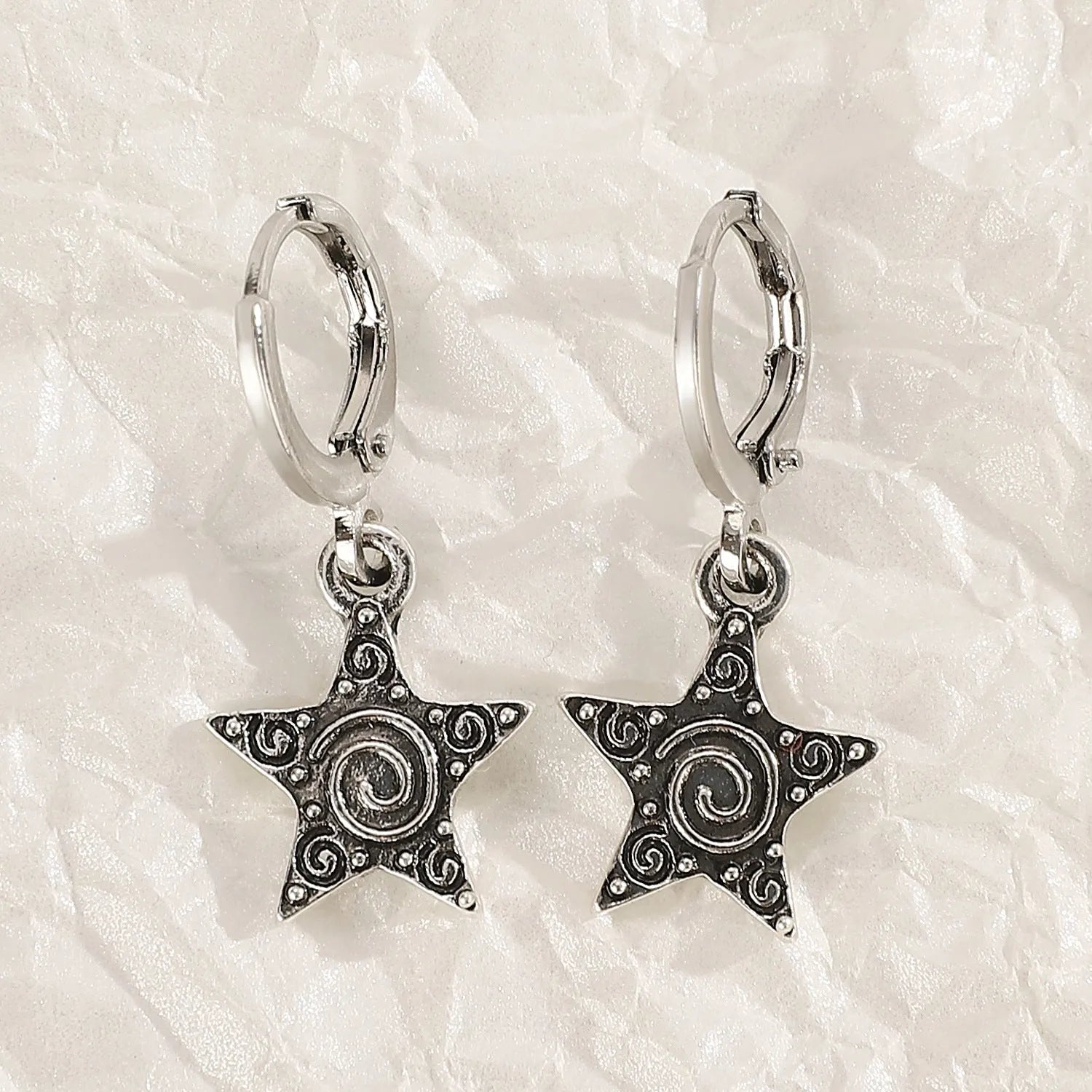 Women's cross crystal earrings in alloy with five colour options showing drip oil finish and geometric designs