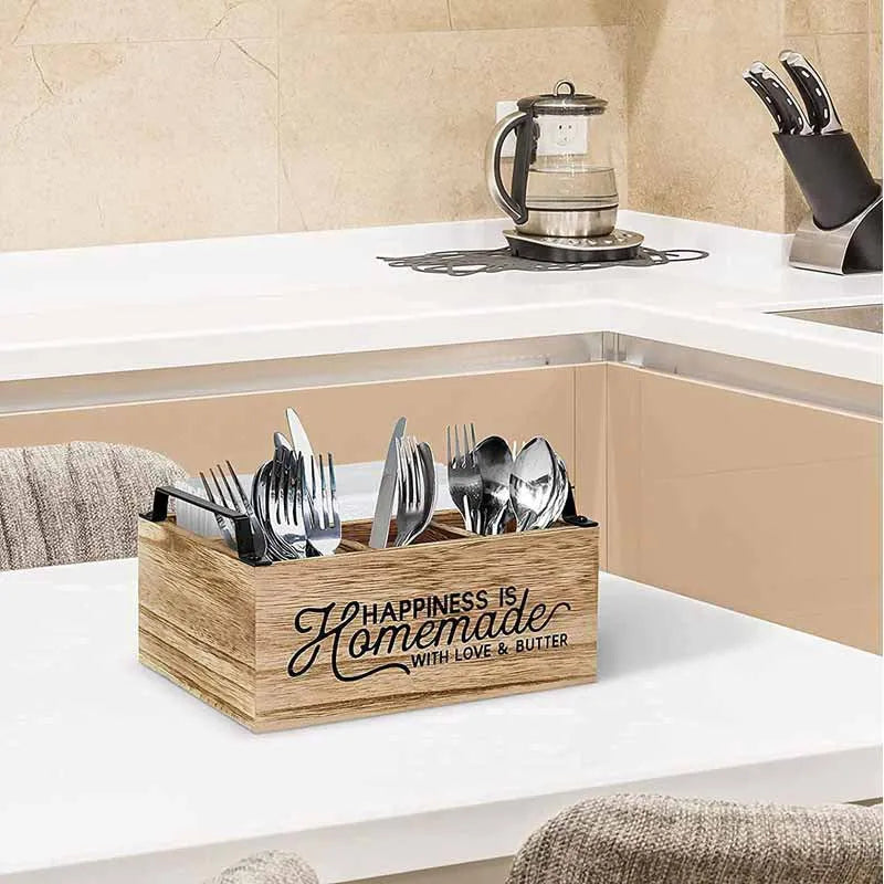 Modern minimalist wooden box with grid dividers for organising kitchen utensils.