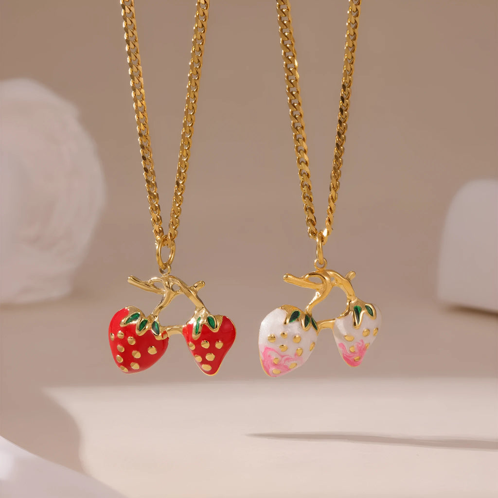 Stainless steel strawberry fruit pendant necklace on an alloy chain, shown in red and white gradient colour options.