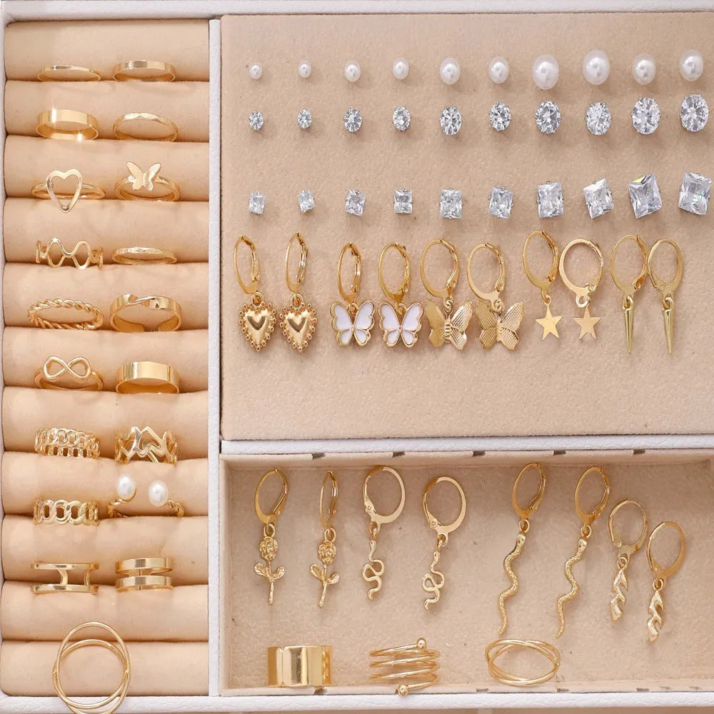 108 geometric alloy earrings with electroplated gold and yellow finishes showing round design elements